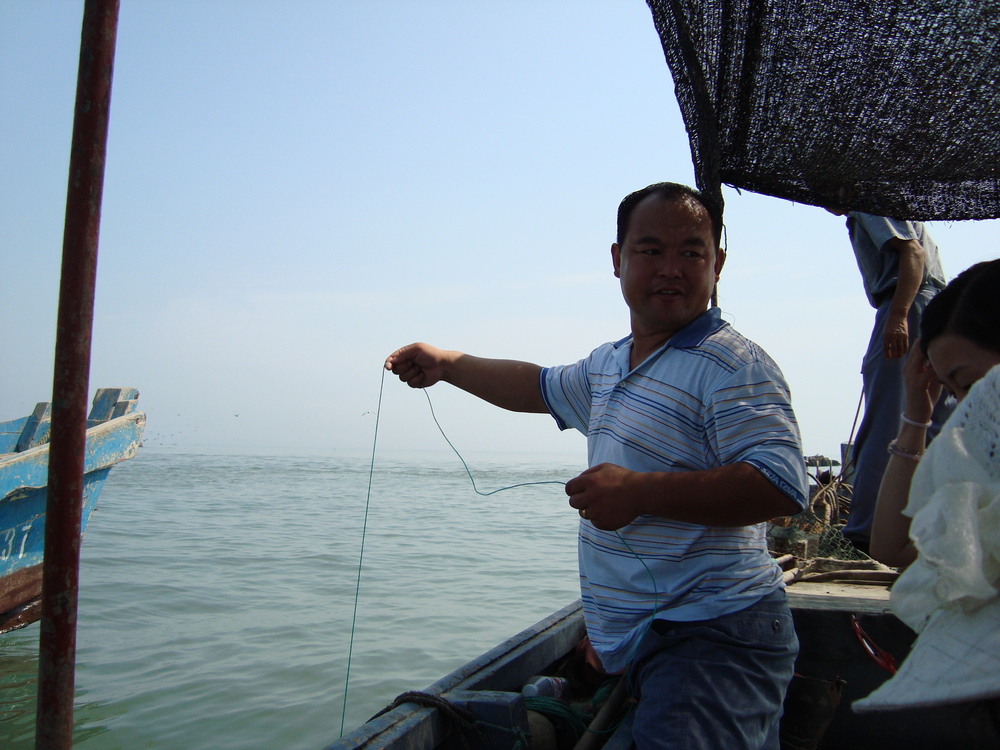 Китай, Чандао, Ей така се лови риба по китайски
