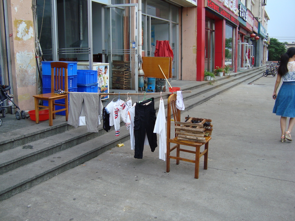 Китай, така се събират повече дрехи за сушене
